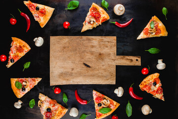 Pizza slices, an empty wooden board, ingredients for cooking pizza on a dark metal background. Pizza menu. Space for text. View from above.