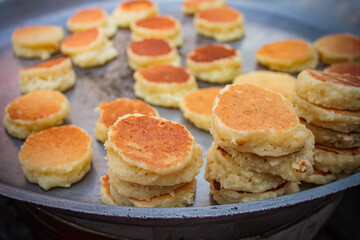 Sweet shredded coconut cake frying, Street food thailand.