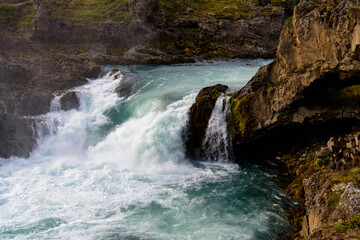 Naklejka premium Godafoss (waterfall of the gods) in the Bardardalur district of Northeastern Region of Iceland