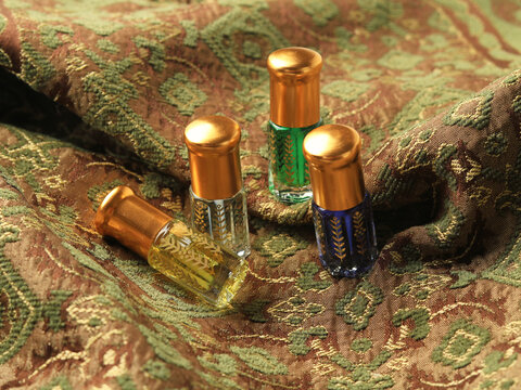 Arabian oud attar perfume in mini bottles.