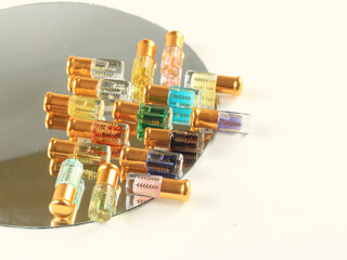 Arabian oud attar perfume in mini bottles.