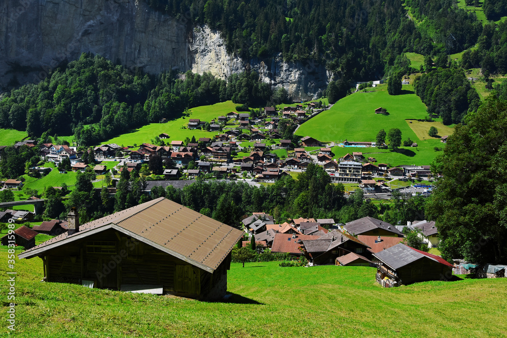 Poster Lauterbrunnen swiss village , famous destination in Jungfrau region, Bernese Oberland, Switzerland. 