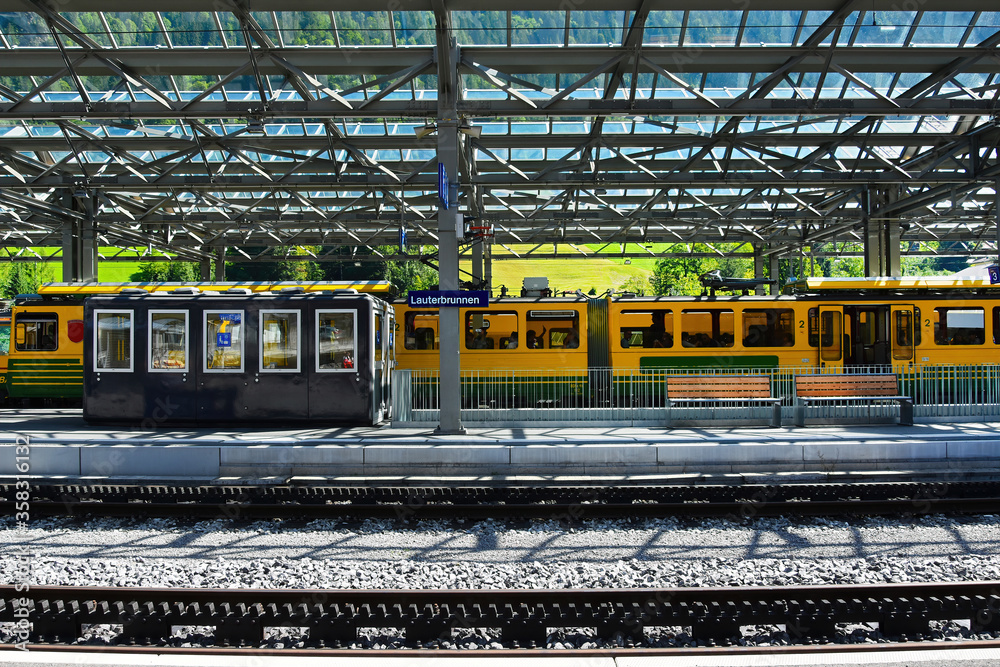 Canvas Prints Railway station in  Lauterbrunnen village part of Bernese Highlands Railway to Grindelwald , Jungfrau region, Bernese Oberland, Switzerland. 