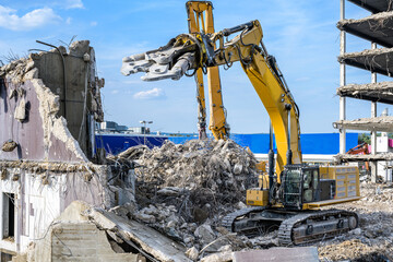 Building House destruction Demolition site Excavator with hydraulic crusher machine ruin house - obrazy, fototapety, plakaty