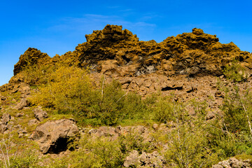 Fototapeta na wymiar Dimmuborgir, a large area of unusually shaped lava fields, east of Myvatn, Iceland