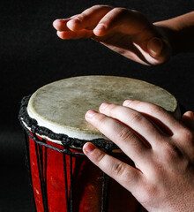 hand holding drum