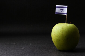 Green apple with Israeli flag