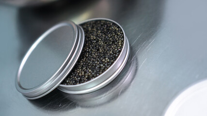 Quality black caviar with sturgeon. Workshop for the production of a quality product. Beluga and trout in the food industry. Stock photo
