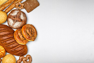 Fresh bread and bakery in the form of background, close-up and with selective focus