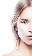 Fototapeta premium Beautiful face of young caucasian girl with natural make-up, perfect skin and blue eyes isolated on white background. Studio portrait