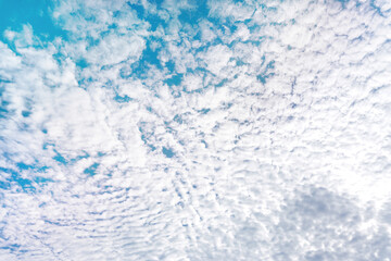 Vivid blue sky with crowded clouds. ( pastel color )
