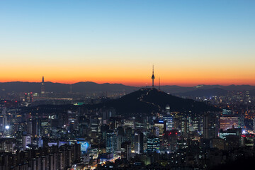 Obraz premium View of Seoul City Skyline and Seoul Tower at Sunrise South Korea