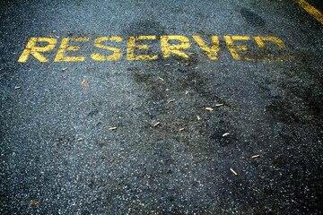 Numerous cigarette butts litter a reserved parking space at a truck stop in central Pennsylvania.