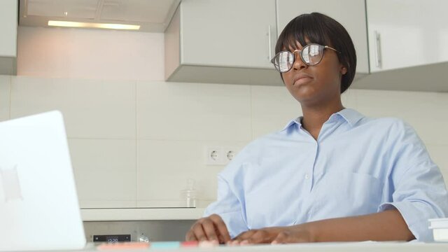 Female freelancer upset about project failure, annoyed by picky client, stress