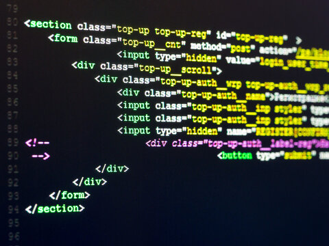 Computer Code HTML. Software development. Software source code. Writing programming code on laptop.