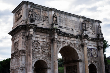 Fototapeta na wymiar Arch of Constantine, the triumphal arch in Rome, located between the Coliseum and the Palatine