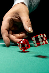 Man gambling at the craps table