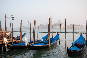 Fototapeta na wymiar A day trip to Venice on a gondola in the Grand Canal