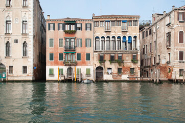 Fototapeta premium A day trip to Venice on a gondola in the Grand Canal
