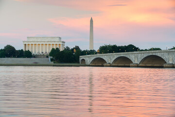 Arlington memorial bridge in Washington D.C. at sunset with Lincoln memorial in the background
