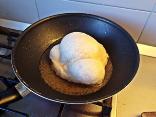 Frying pita bread in the pan