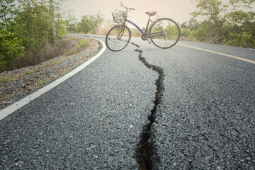 Fototapeta na wymiar This is picture of broken or split asphalt road with selective focus of broken line