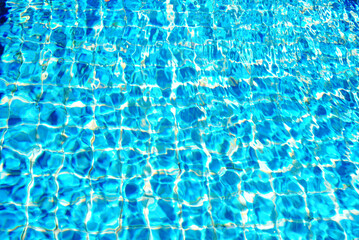 Fototapeta na wymiar Abstract water liquid movement in the swimming pool.