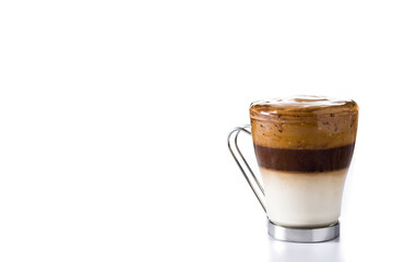 Creamy iced dalgona coffee in glass isolated on white background. Copy space