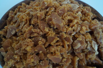 The palm sugar or Jaggery on white background