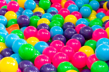 Fototapeta na wymiar Multi color vibrant plastic ball in kids playing station.
