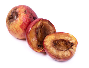 Group of rotten nectarines