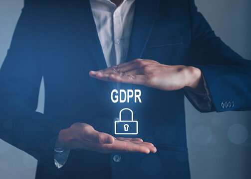 Businessman hands holding on GDPR problematics icon. General data protection regulation concept.