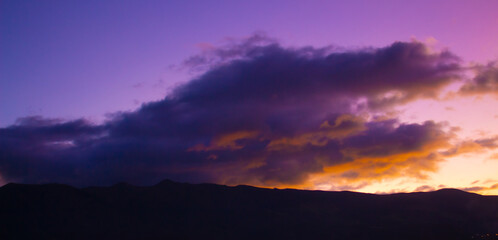 Fototapeta na wymiar Cloudy Sunset in the mountains