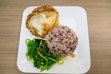Fototapeta na wymiar Crispy Pork with Kale