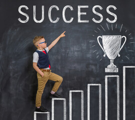 Portrait of little businessman kid boy. Success, creative and start up concept. Success and win...