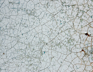 White chipping paint on metal