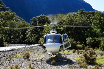 Running helicopter landed on gravel in Campbell's Kingdom - Fjordland  National Park - Doubtful...
