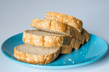 Whole wheat bread on a Blue Plate, Vintage Sweet tone.