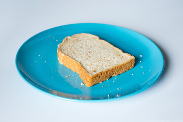 Whole wheat bread on a Blue Plate, Vintage Sweet tone.