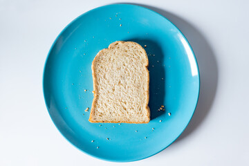 Whole wheat bread on a Blue Plate, Vintage Sweet tone.