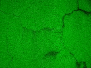 green cracked wall texture. green background