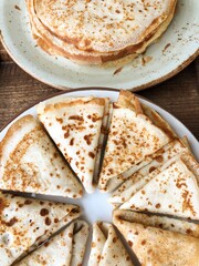 Delicious fresh pancakes on the table macro