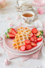 Simple crispy homemade waffles with strawberries