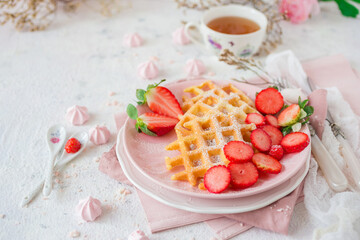 Simple crispy homemade waffles with strawberries