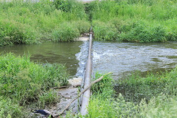 The rapid flow of water in the river. Moscow, Russia.