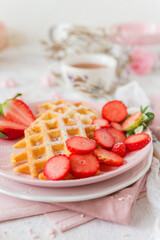 Simple crispy homemade waffles with strawberries
