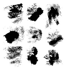 Set of vector rough imprints smears black paint on a white background
