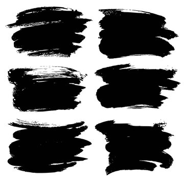 Abstract black thick smear of paint isolated on a white background