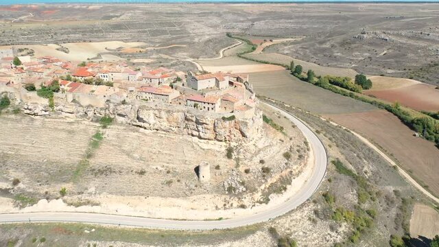 aerial view over Rello village (flying around a POI), province of Soria, Castilla y Leon, Spain