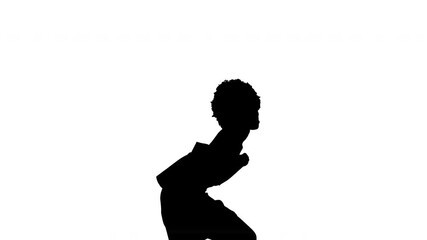 Silhouette of shot of a woman with afro hairdo demonstrating traditional Afro style dance. Dancer squatting down and standing up. Isolated, black and white